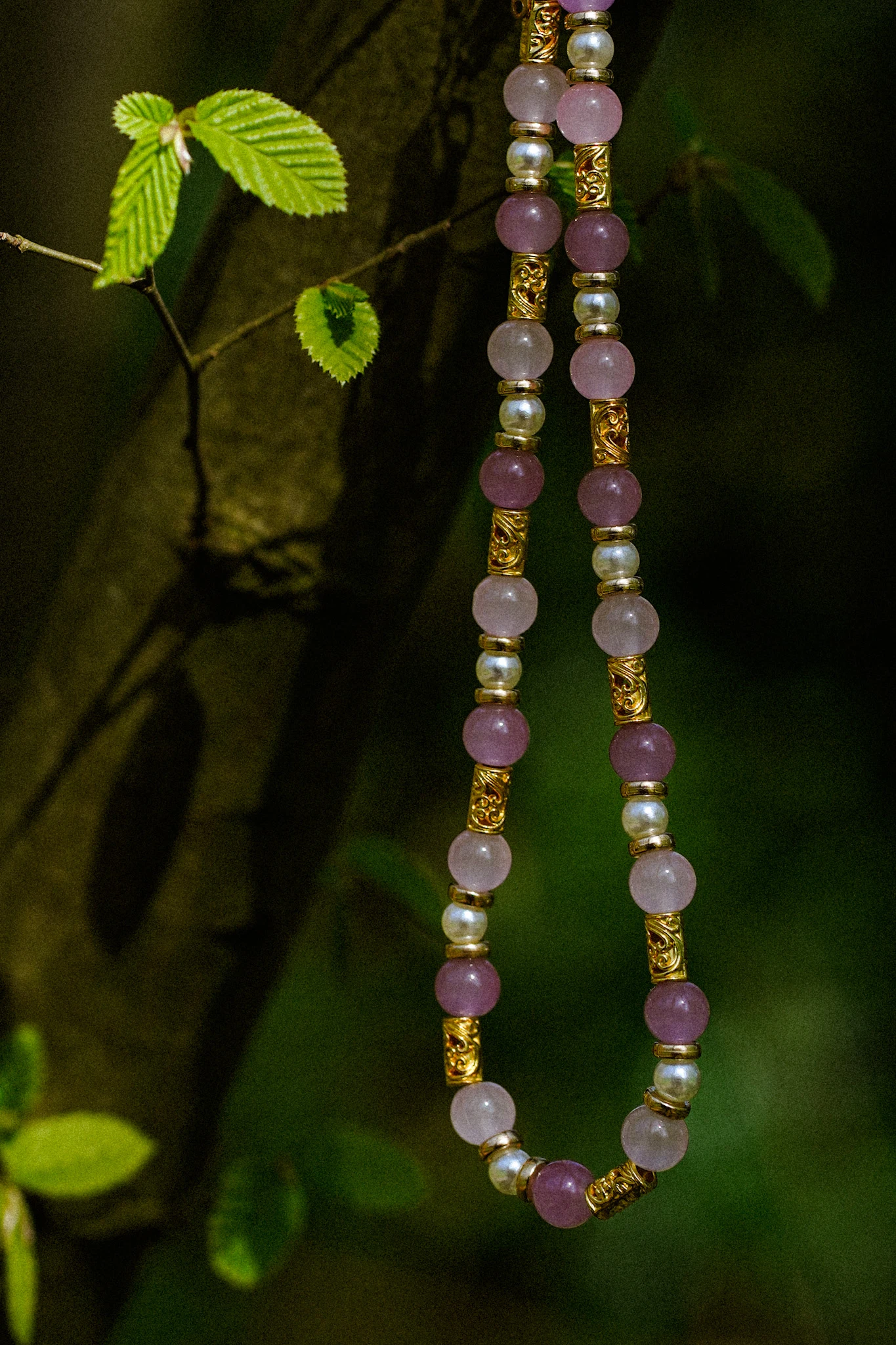 Wildflower Spell green pendant necklace styled with a white blouse by Lunar Lens Creative Agency