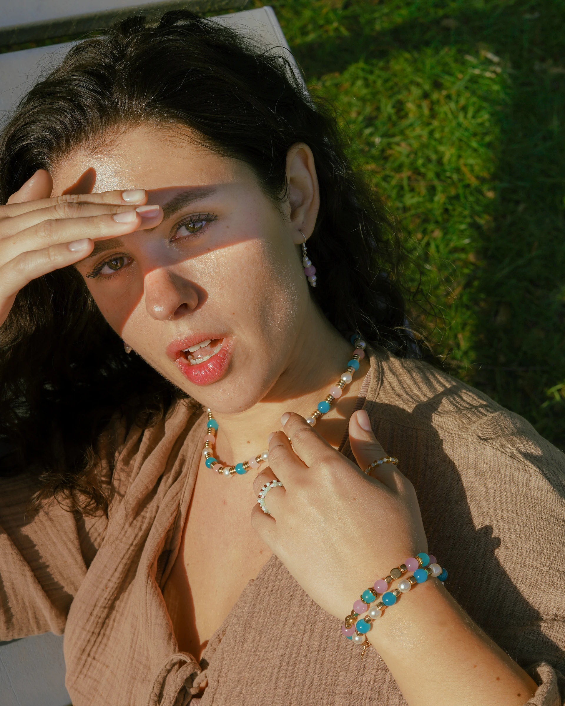 Jewellery campaign portrait with bracelets in golden sunlight by Lunar Lens Creative Agency
