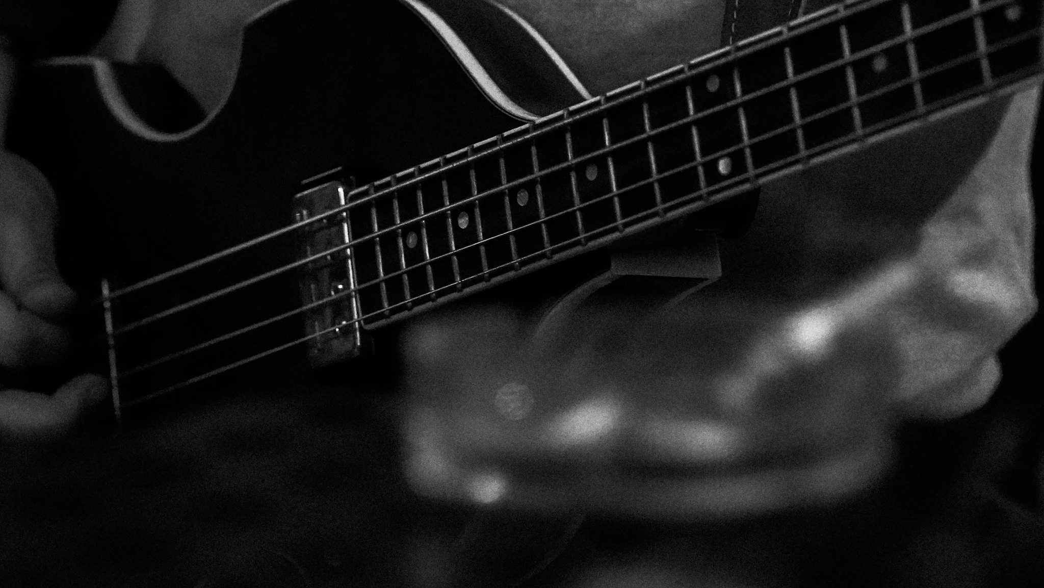 Bagremov Med Band black-and-white bass guitar detail by Lunar Lens Creative Agency