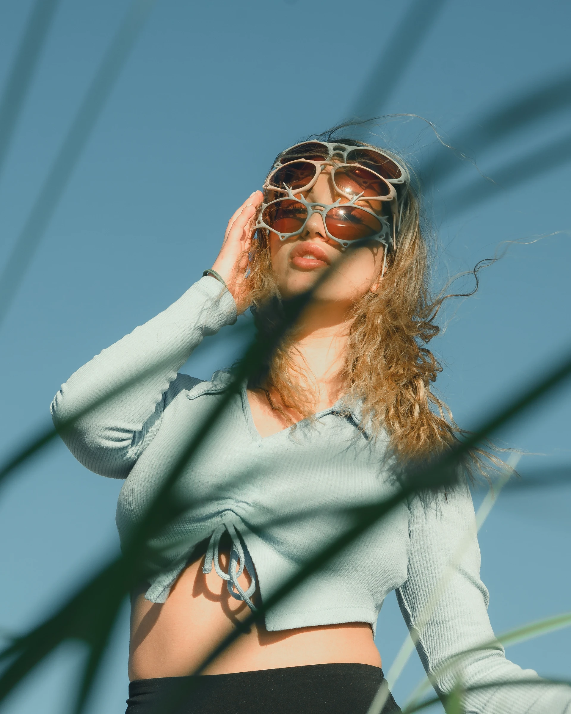 Editorial sunglasses campaign portrait with sculptural eyewear by Lunar Lens Creative Agency